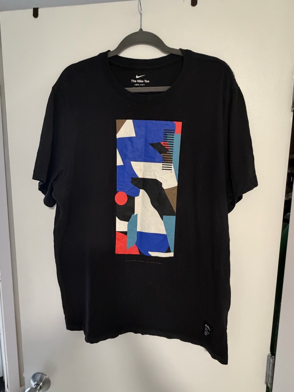 Nike Men's Black Short Sleeve Tee with Blue, Red & White Graphic